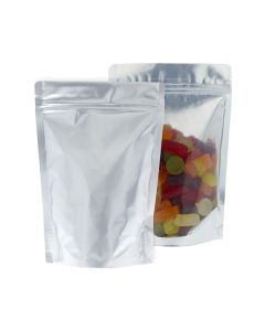 Bolsa doypack transparente y plata mate con muesca de desgarre y cierre zip.